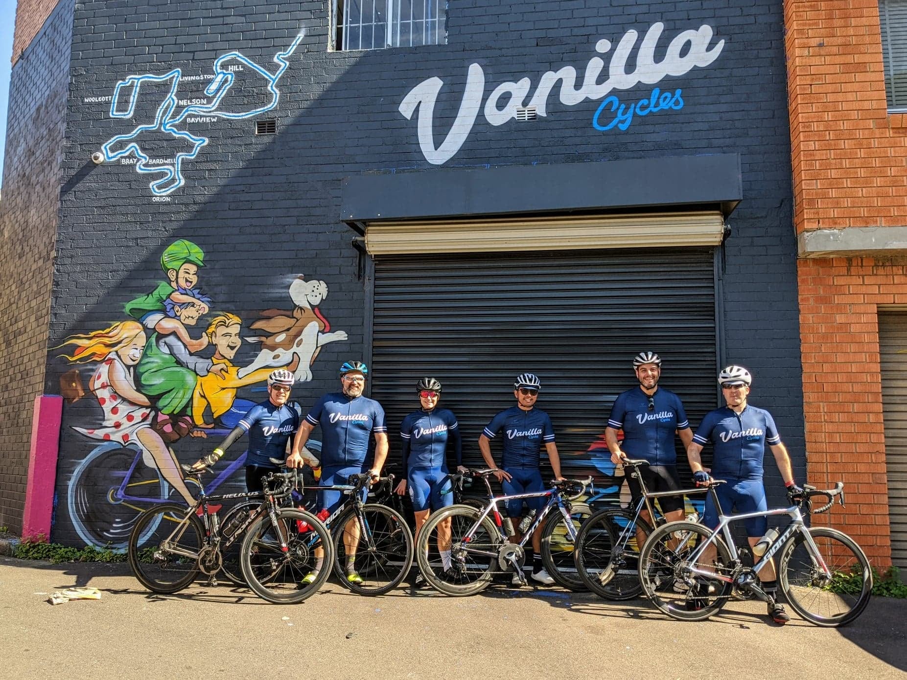 The Vanilla Cycles team with their bikes outside the Marrickville shop